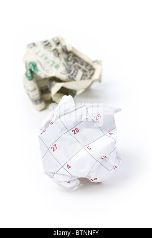 Calendar paper ball and dollar, concept of Wasting Time and money Stock Photo