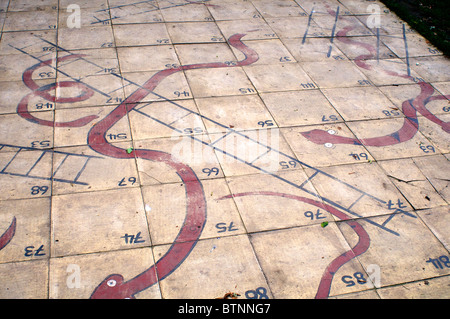 Outdoor snakes and ladders game Stock Photo