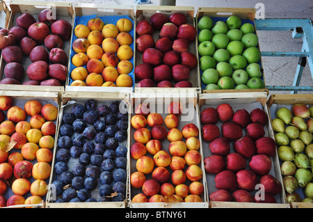 a bright display of summer fruit on sale Stock Photo