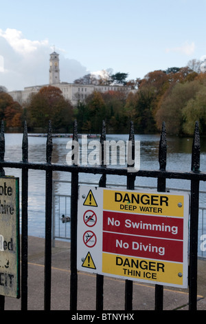 Danger sign warning no swimming no diving and thin ice Stock Photo