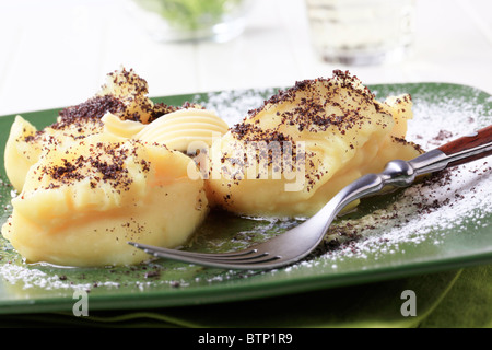 Sweet potato dumplings with poppyseed Stock Photo