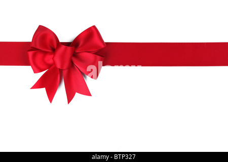 Red ribbon with bow on white Stock Photo