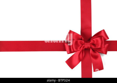 Red ribbon with bow on white Stock Photo