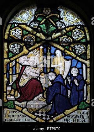 Stained glass by Frederick Charles Eden window depicting King Henry II of England granting a charter to an Abbot of Glastonbury; Longbridge Deverill Stock Photo