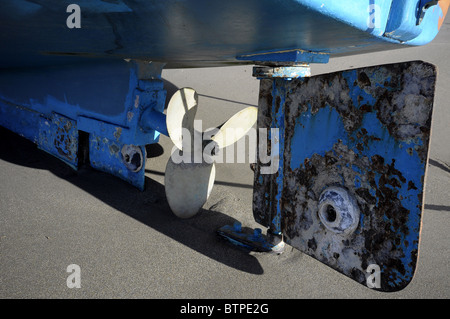 Hull view of a fishing boat propeller and rudder Stock Photo