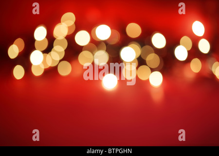 Defocussed lights on red Stock Photo
