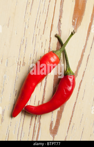 red hot peppers on wooden background Stock Photo