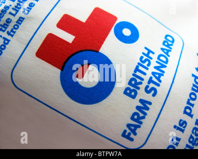 British farm standard logo from the assured food standards association of the little red tractor symbol Stock Photo