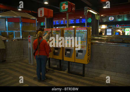 People buying metro tickets Hlavni Nadrazi the main railway station central Prague Czech Republic Europe Stock Photo