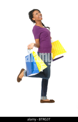 Teenage girl with colorful shopping bags. Stock Photo