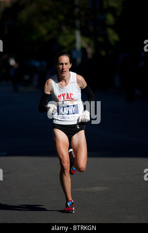 Kathy Newberry of the United States near mile 23 in the 2010 ING New York City Marathon. She finished 17th in the Women's Div Stock Photo