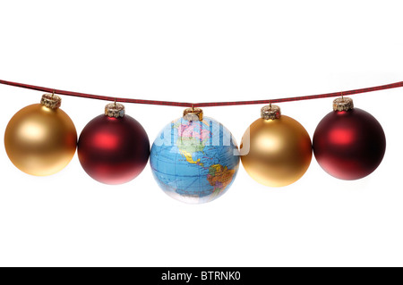 String of Christmas ornaments with globe as central ornament or bauble. Stock Photo