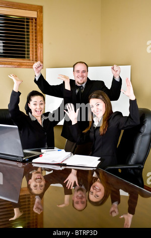 A group of professionals excited about a new development Stock Photo
