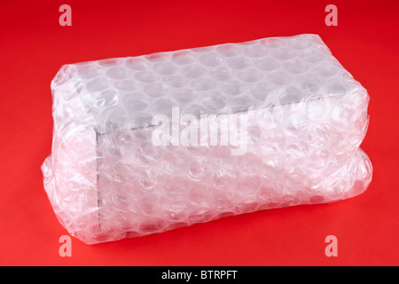 Rectangular parcel box wrapped in large bubblewrap Stock Photo