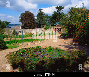 Glin Castle, Co Limerick, Ireland; 18Th Century Castle's Walled Garden With Lily Pond And Rustic Temple Stock Photo