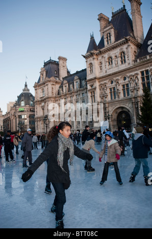 Paris, France, Teenager Ice Skaters on Ice Skating Rink at Paris City Hall hotel de ville Paris Building, WINTER SCENE, young teenage french girl Stock Photo