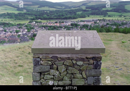 Carvings by the artist Mary Kenny on top of Pirn Hill an Iron Age Hill