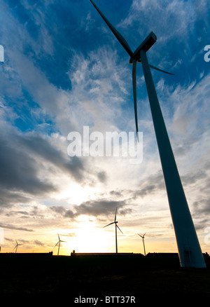 Wind turbines against a sunset sky Stock Photo - Alamy