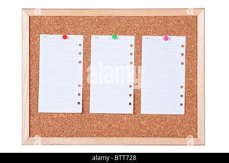 Corkboard with three blank paper notes, isolated on white background. Stock Photo