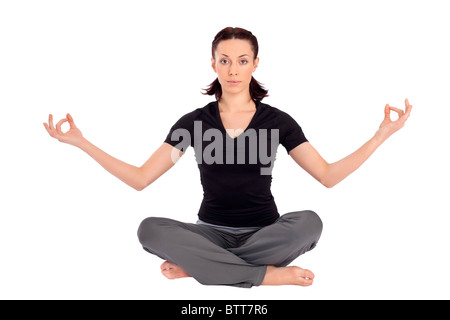 Young beautiful woman practicing breath control yoga asana, isolated on white background. Stock Photo