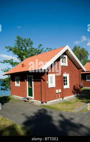 traditional swedish house red houses sweden timber building red oxide paint summer summerhouse houses home homes Stock Photo