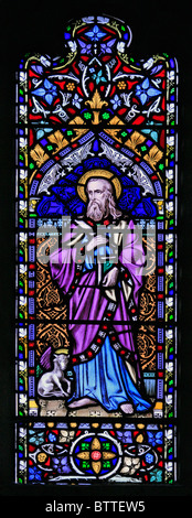 A stained glass window depicting Saint Luke the Evangelist, Parish Church of St James the Great, Bratton, Wiltshire Stock Photo