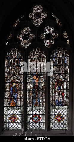 A 14th century stained glass window depicting The Crucifixion of Jesus, Edington Church, Wiltshire Stock Photo