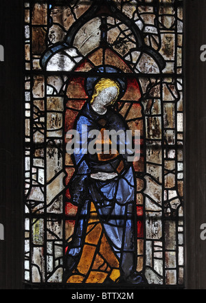 A 14th century stained glass window depicting the Virgin Mary at the Crucifixion, Edington Priory Church, Wiltshire Stock Photo