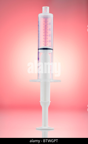 Measured syringe Stock Photo