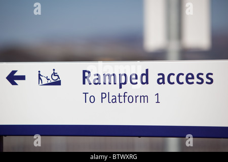 modern railway station signs for ramped access for prams and for those with disabilities Stock Photo