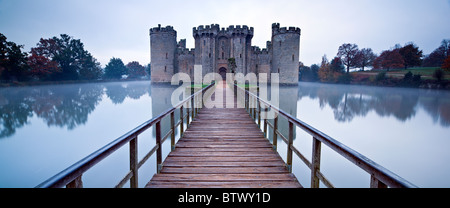 a calm morning sets off this autumnal scene at Bodiam Castle, East Sussex Stock Photo