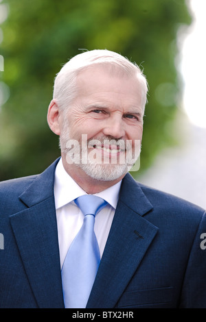 caucasian senior businessman portrait toothy smiling Stock Photo