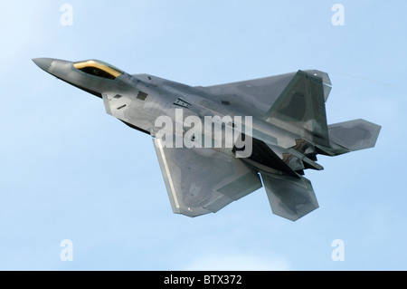 F-22 Raptor aircraft operated by the US Air Force departing RAF Fairford, UK. Aircraft is a Lockheed Martin F-22A Raptor. Stock Photo
