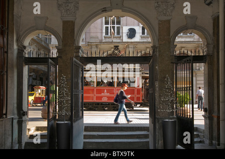 The 'nostalgy' tram running between Taksim Square and Tunel on Istiklal Cadesi, Beyoglu,in Istanbul, Turkey Stock Photo