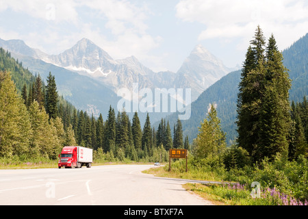 Trans-Canada Highway at Sir Donald rest area, Glacier National Park, British Columbia, Canada.  The sharp peak on the right is Mount Sir Donald. Stock Photo