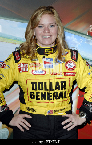 Indy 500 Driver Sarah Fisher Autograph Signing to Promote SimCraft Car-Racing Simulators at CES Stock Photo