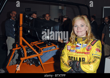 Indy 500 Driver Sarah Fisher Autograph Signing to Promote SimCraft Car-Racing Simulators at CES Stock Photo