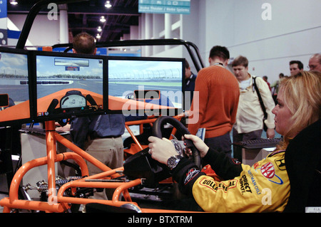 Indy 500 Driver Sarah Fisher Autograph Signing to Promote SimCraft Car-Racing Simulators at CES Stock Photo