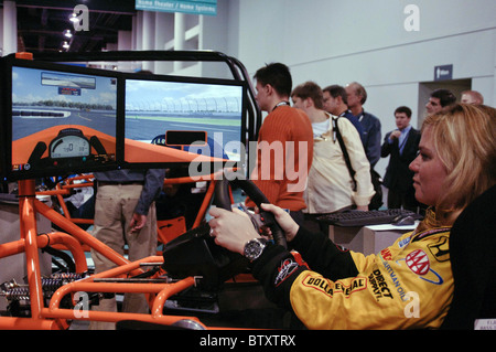 Indy 500 Driver Sarah Fisher Autograph Signing to Promote SimCraft Car-Racing Simulators at CES Stock Photo