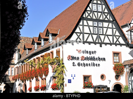 Half timbered winery (weingut) in the pretty village of St. Martin in the Pfalz or Palatinate region of Western Germany and on the famous wine route Stock Photo