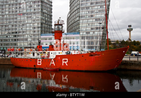 Former Mersey Bar lightship - Planet, overcast day, Canning Dock, Liverpool, UK. (Park West development, Liverpool One beyond.) Stock Photo