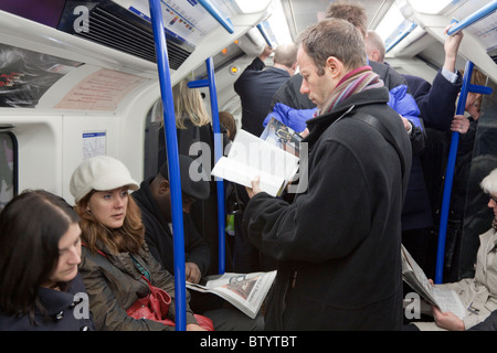 London Underground Victoria Line Train during evening rush hour. Stock Photo