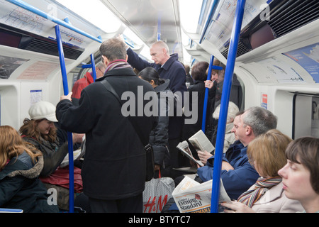 Evening Rush Hour - New Victoria Line Train - London Underground Stock Photo