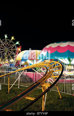 County fair amusement rides at night. Stock Photo