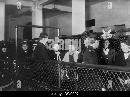 Vintage photo circa 1907 of female immigrants being processed at Ellis Island in New York. Stock Photo