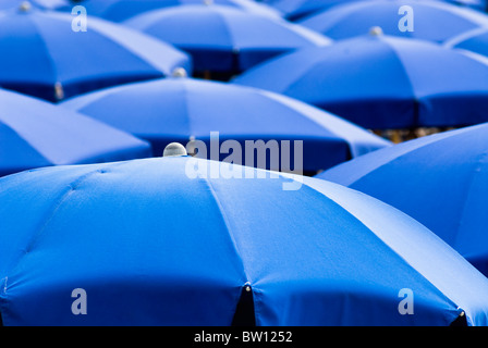 Blue sunshades, Italy, Europe Stock Photo