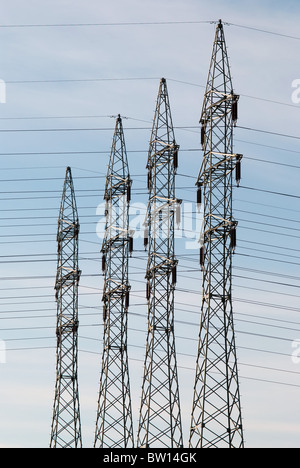 High voltage towers against blue sky background in Brazil Stock Photo ...
