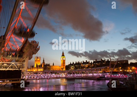 The London Eye and Houses of Parliament on the Thames embankment,, London, UK. Stock Photo