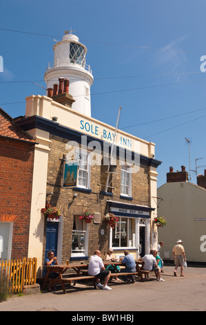 The Sole Bay Inn pub with people sitting outside in Southwold , Suffolk , England , Great Britain , Uk Stock Photo