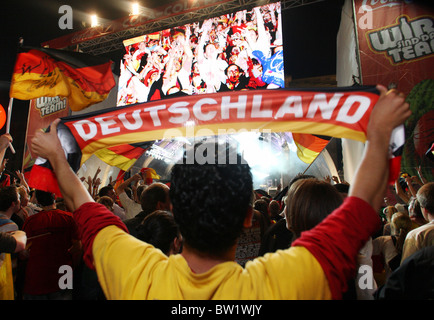 Football fans at the Brandenburg Gate, Berlin, Germany Stock Photo